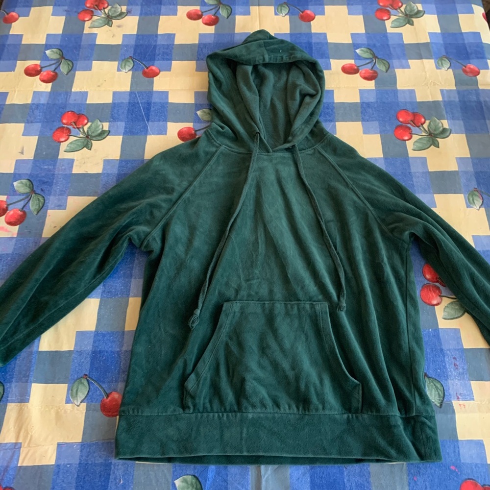 A green women’s sweater